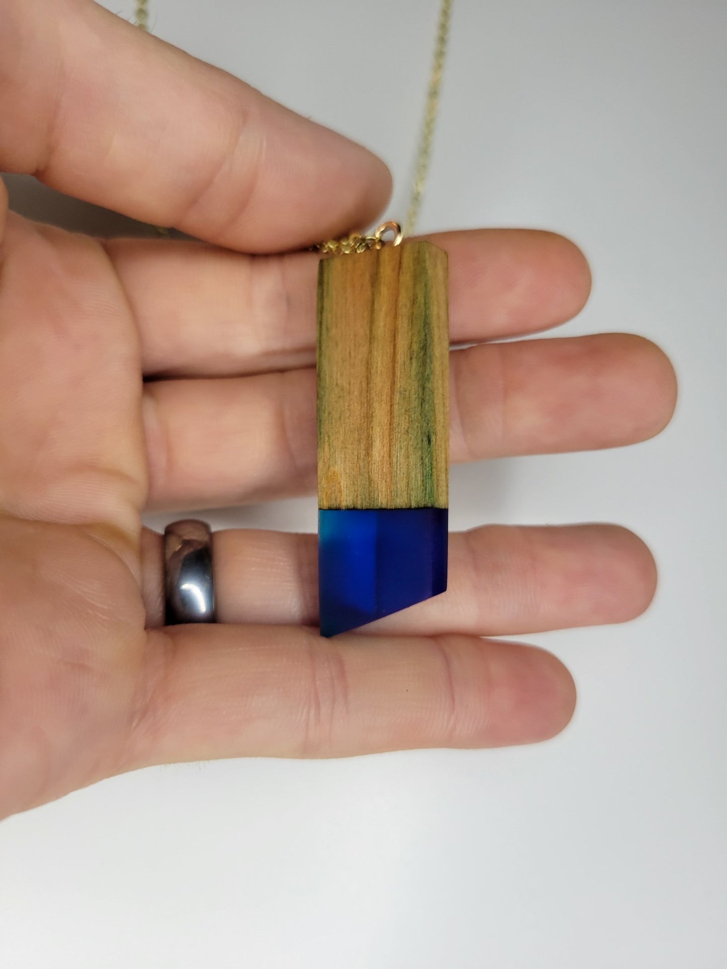 Naturally Fungus-Stained Wooden Pendant With Blue Epoxy
