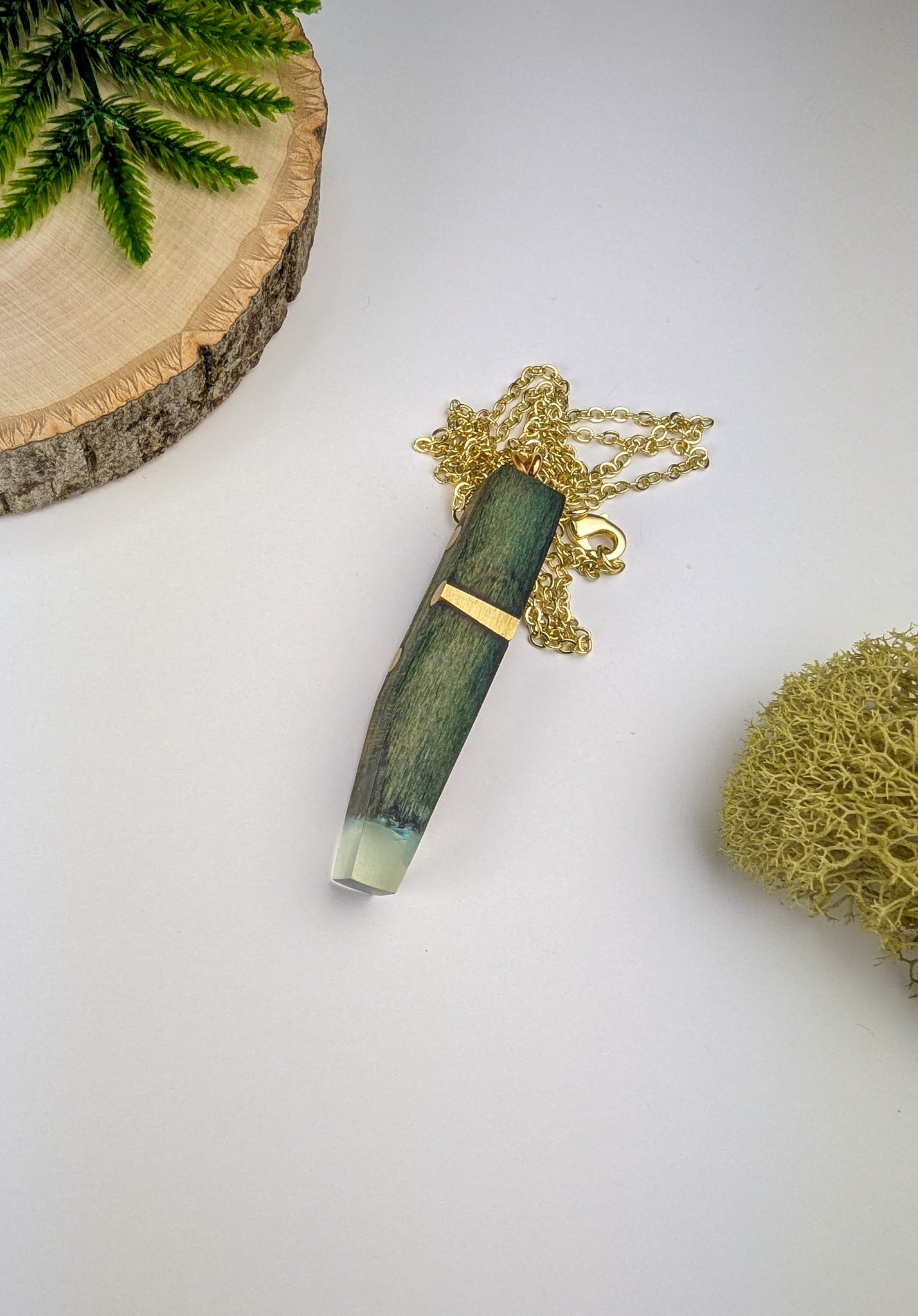 Chlorociboria Wood, Brass Rods, Clear Epoxy and Blue Quartz Pendant