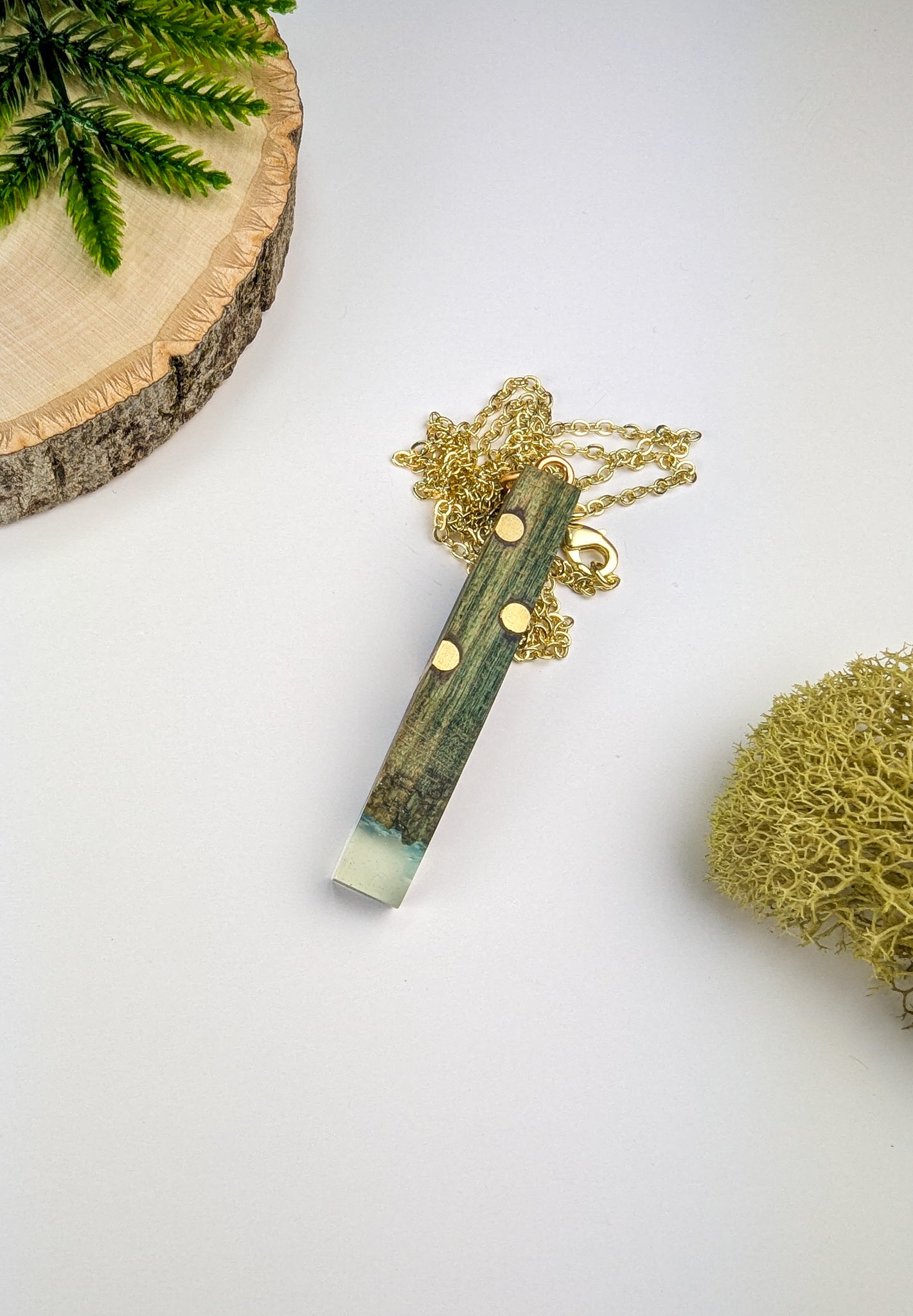 Chlorociboria Wood, Brass Rods, Clear Epoxy and Blue Quartz Pendant