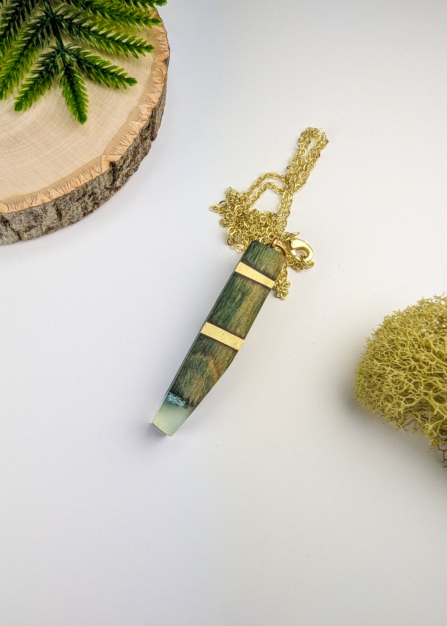 Chlorociboria Wood, Brass Rods, Clear Epoxy and Blue Quartz Pendant