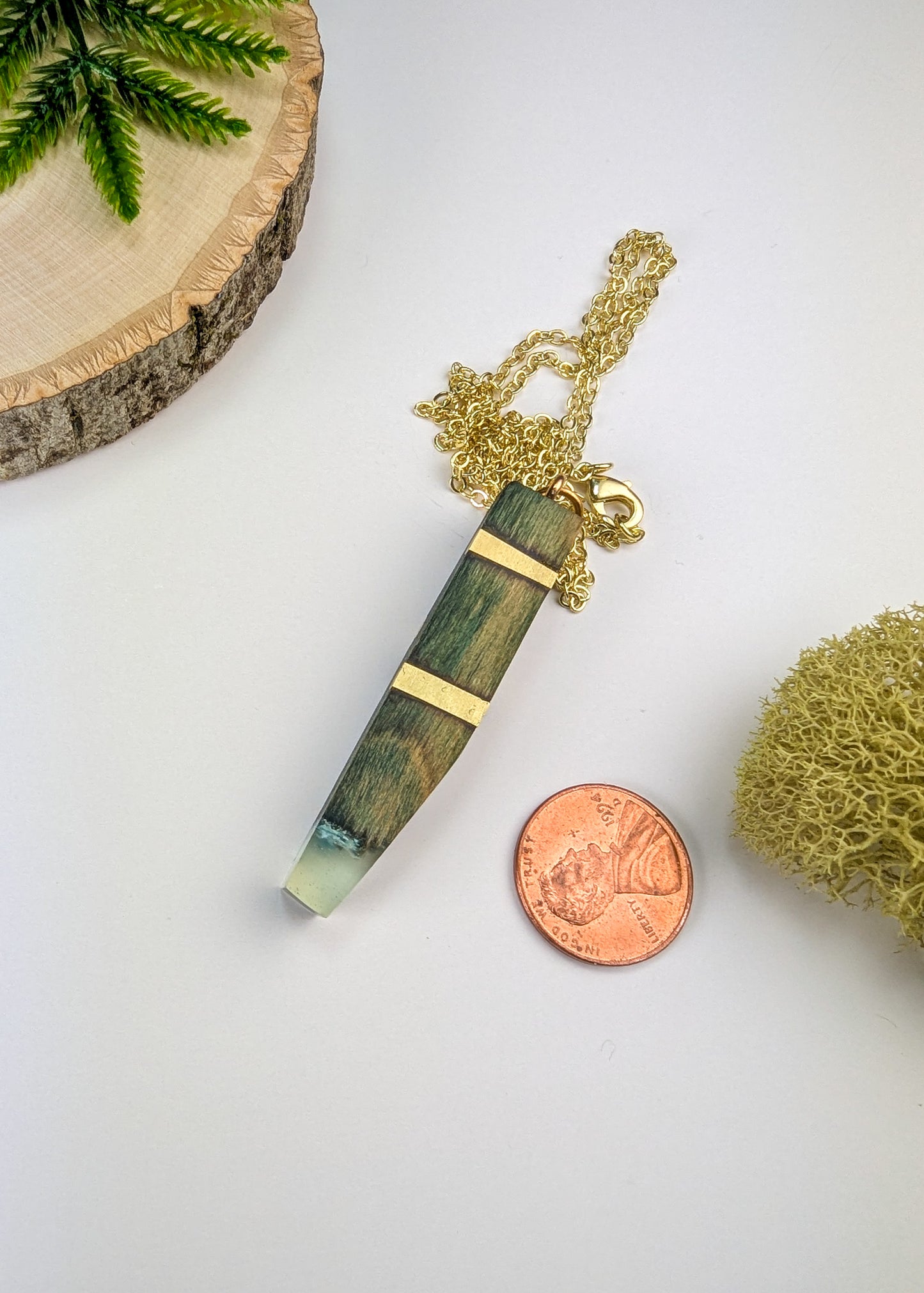 Chlorociboria Wood, Brass Rods, Clear Epoxy and Blue Quartz Pendant